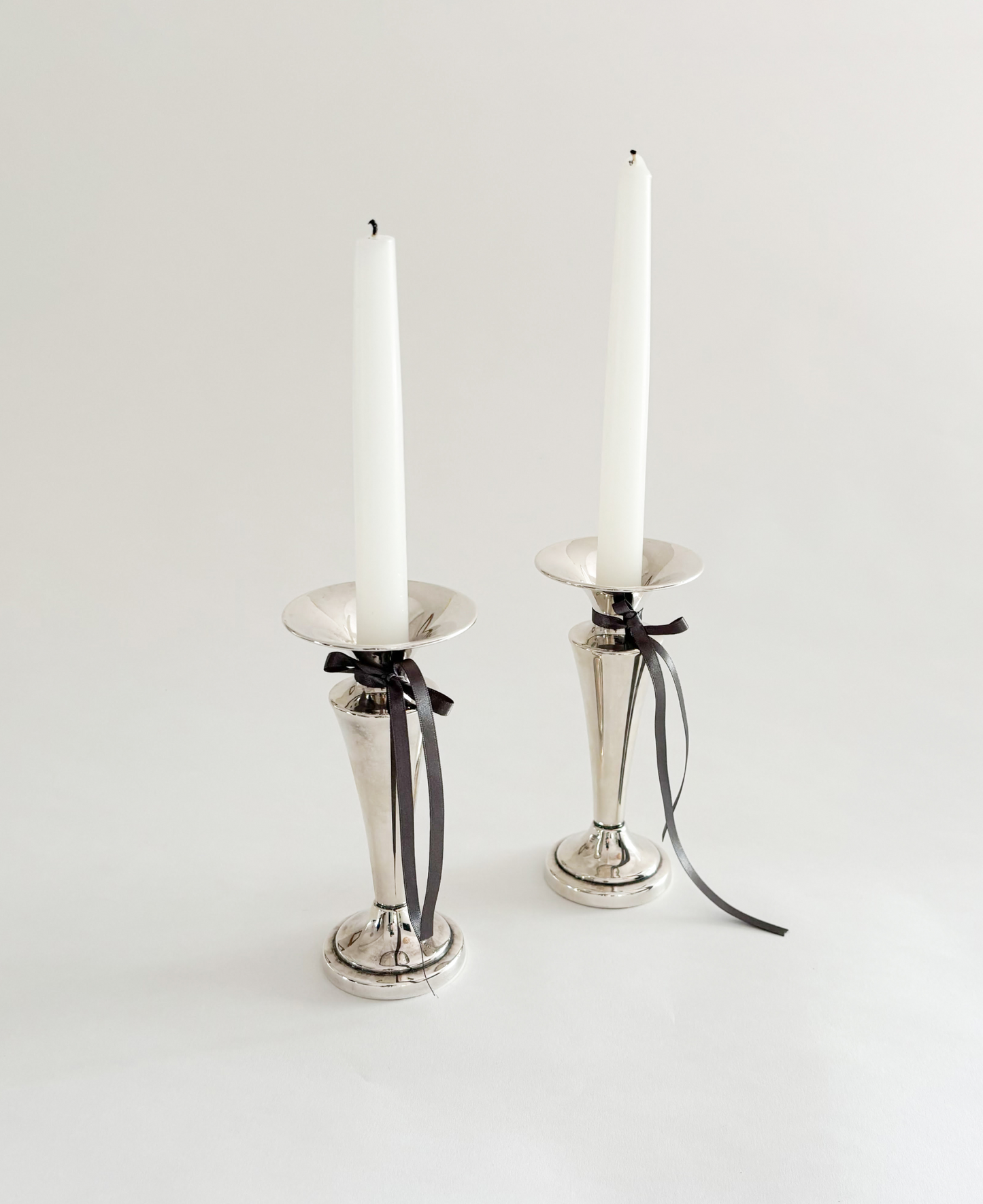 SET OF SILVER PLATED CANDLESTICKS