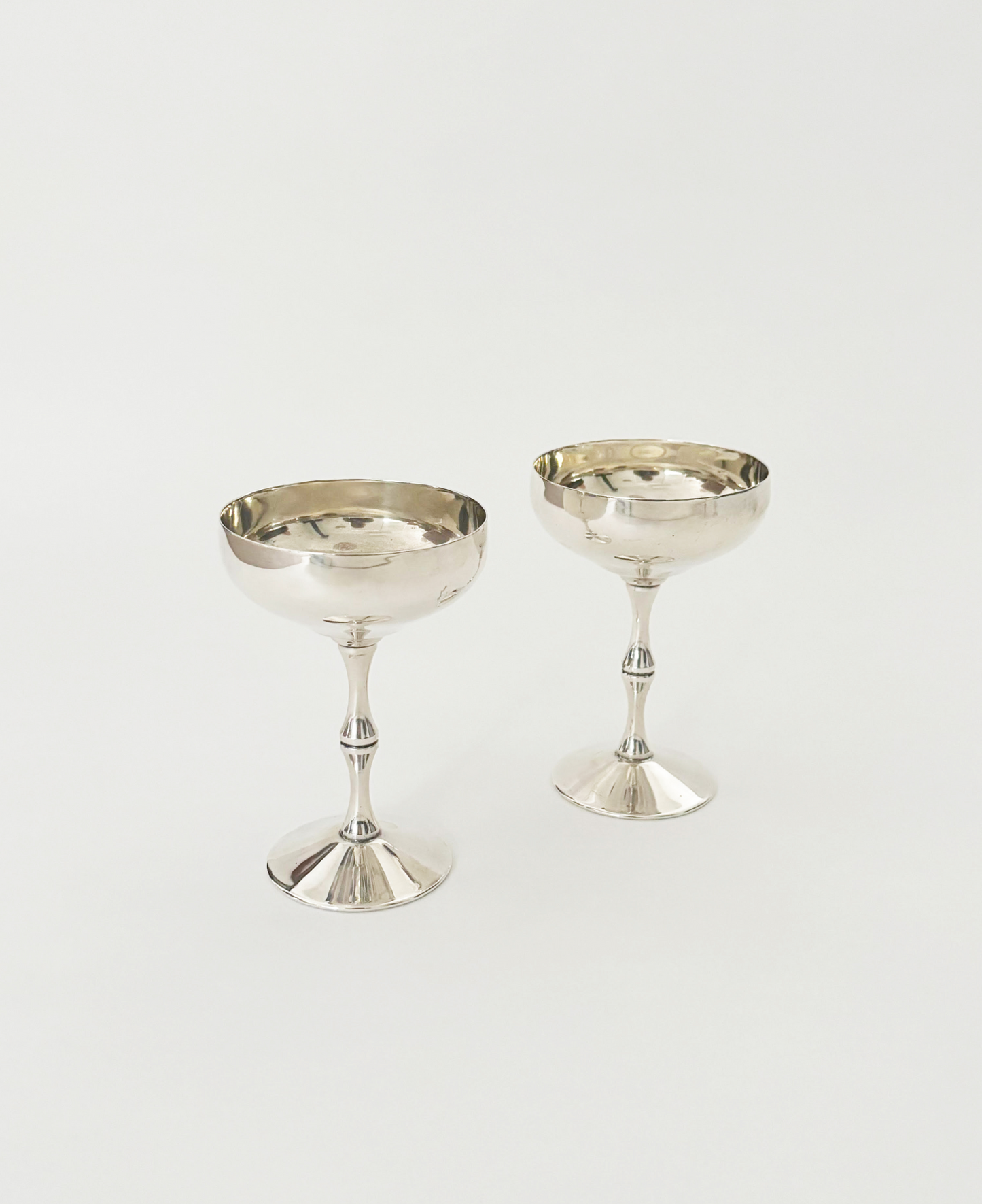 SET OF 2 TALL SILVER COUPES